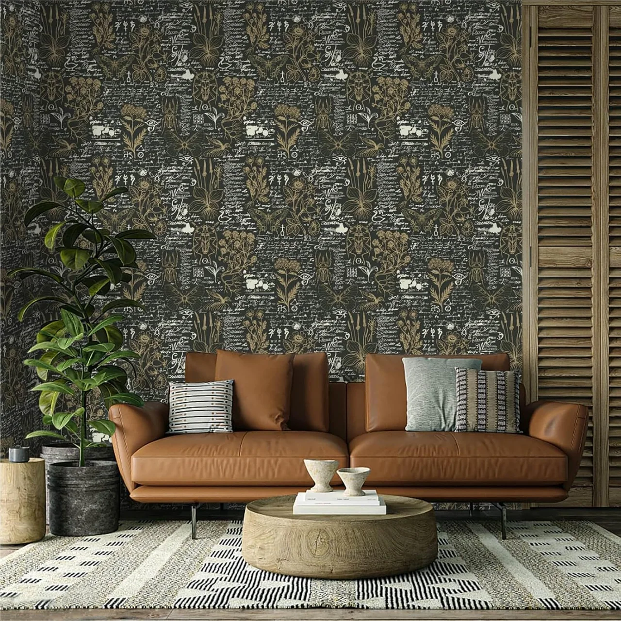 Black Leaf behind a leather sofa