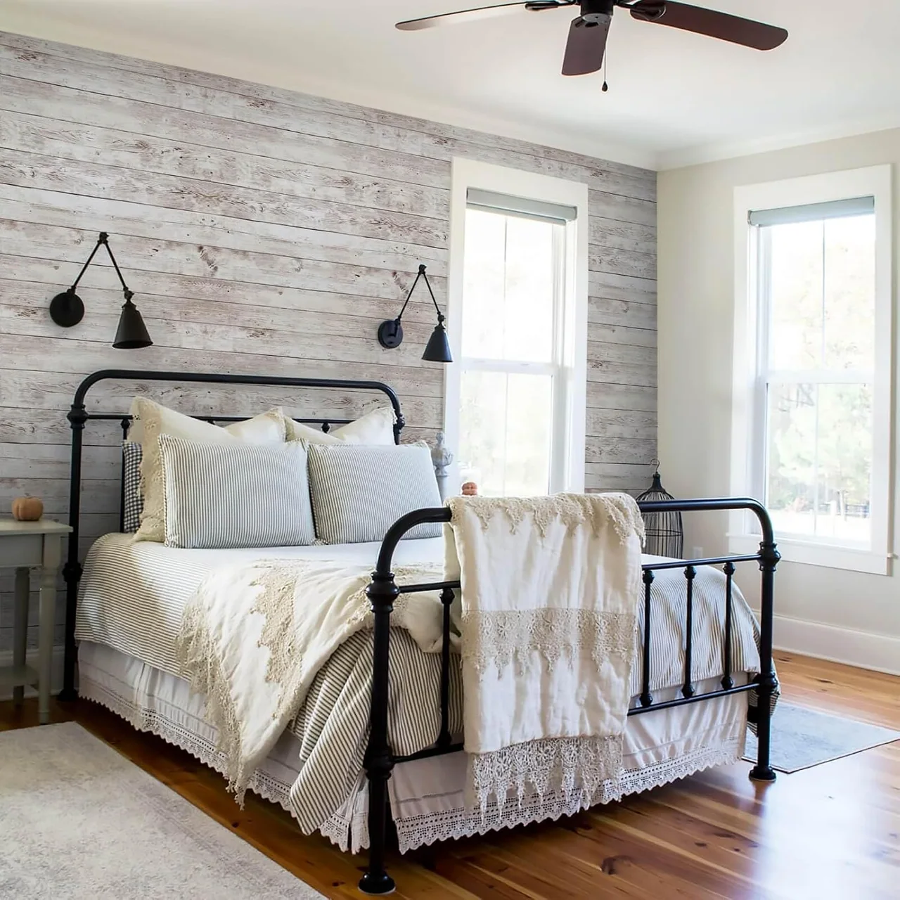 Wood Grain on the wall behind an iron bed